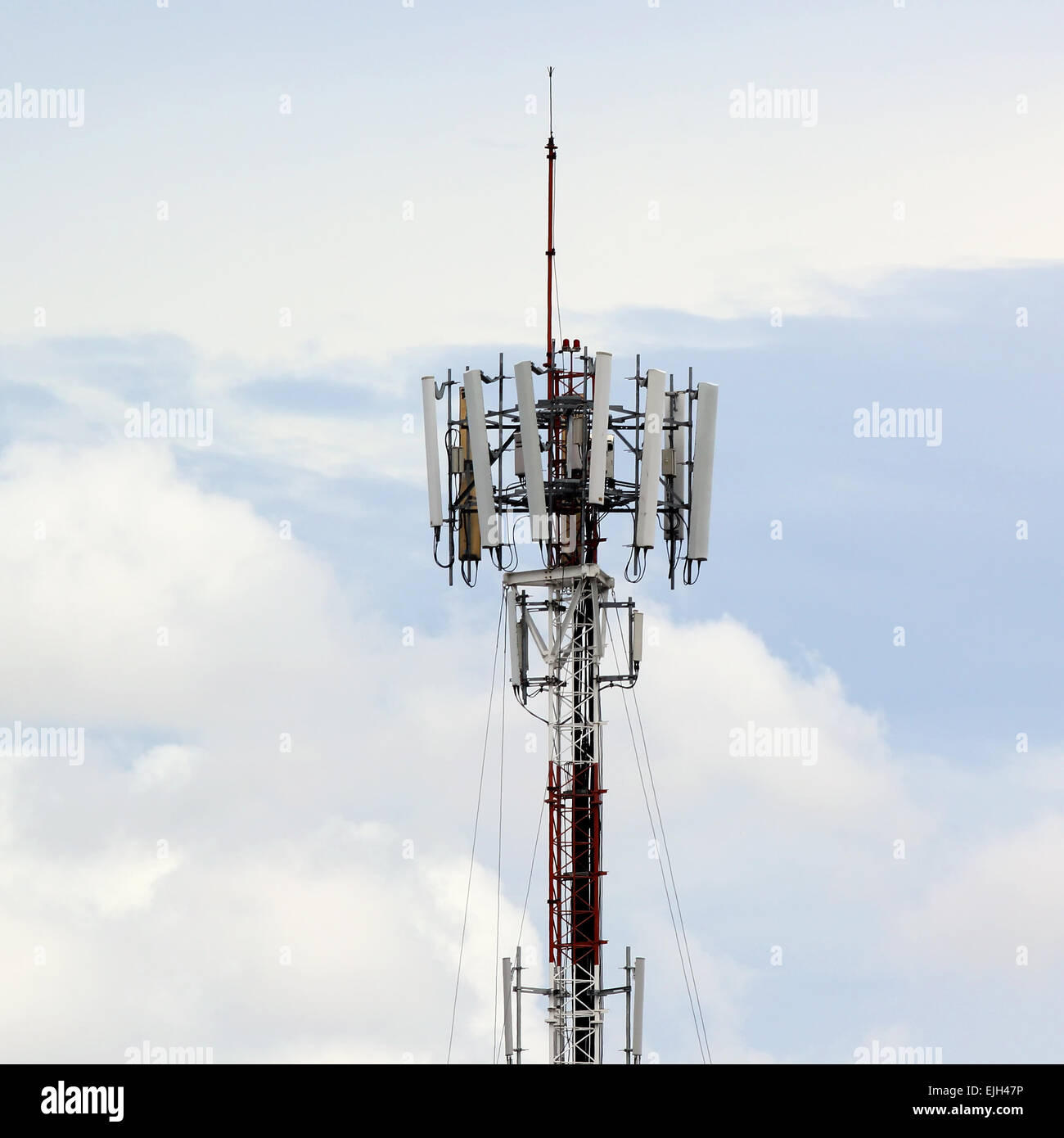 Telecommunications tower on sky background Stock Photo