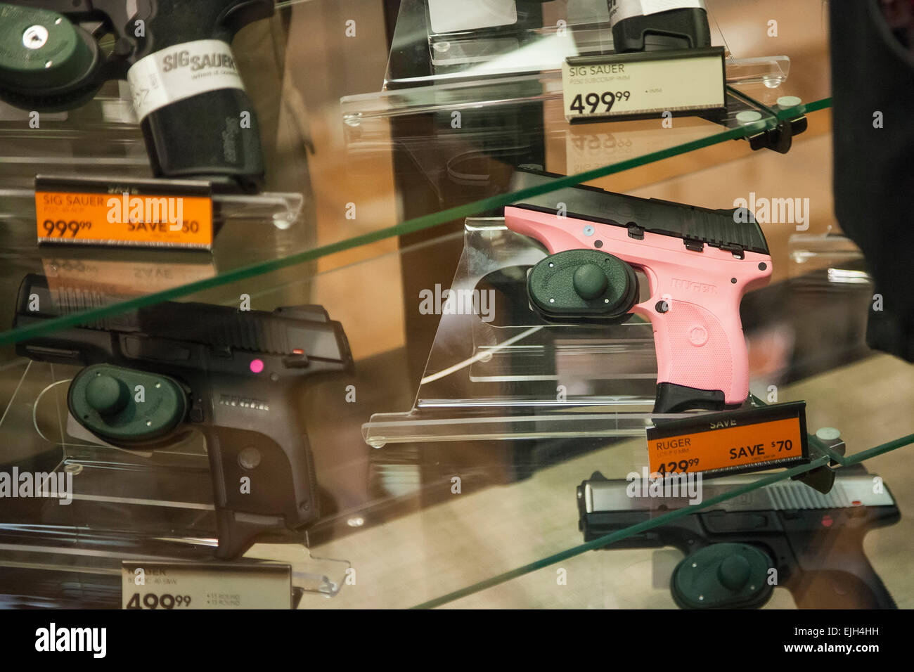Troy, Michigan - A pink Ruger handgun designed for women on sale at the Field & Steam outdoors store. Stock Photo