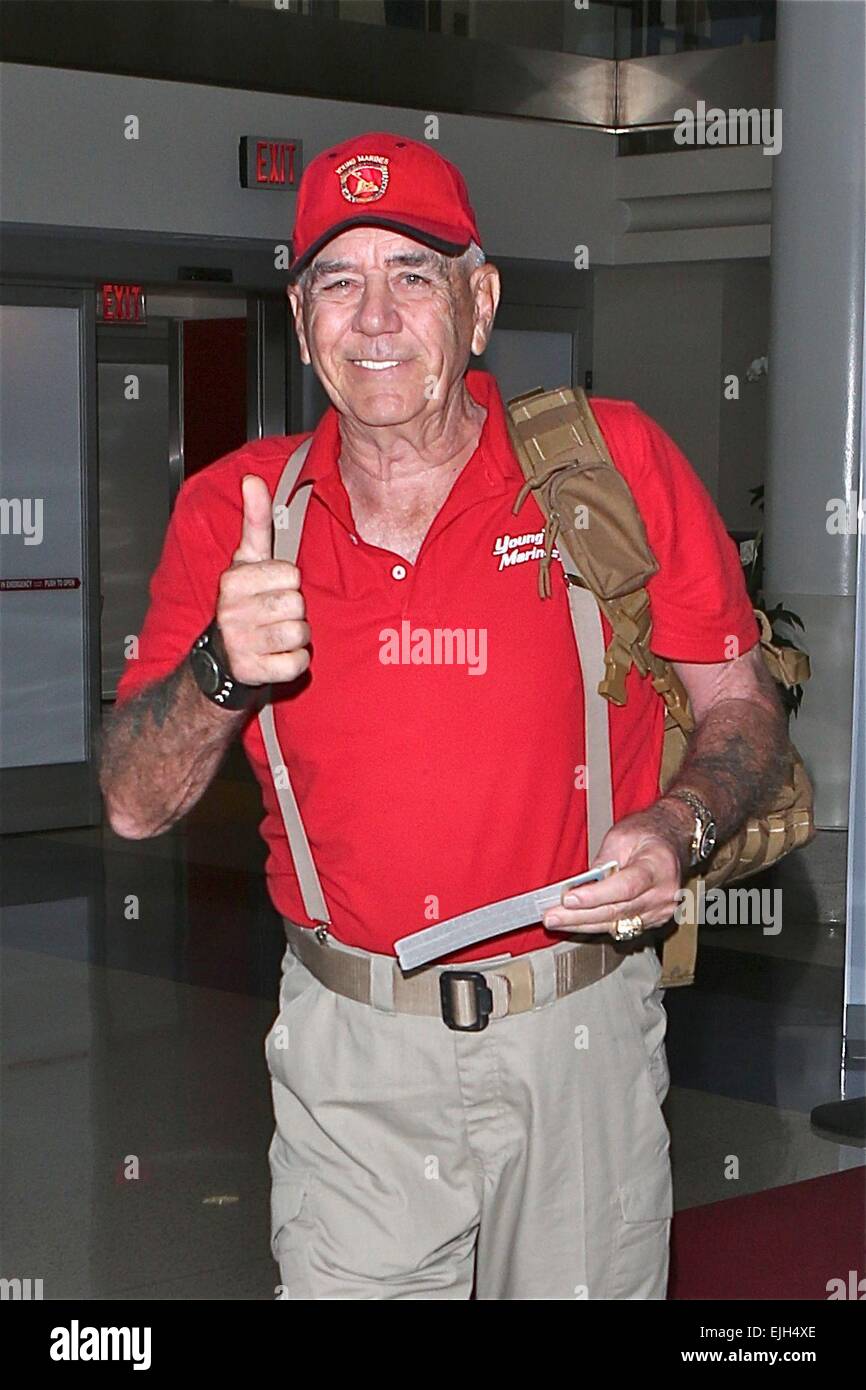 R. Lee Ermey best known for his role as the austere Gunnery Sergeant  Hartman in Full Metal Jacket, leaves Los Angeles International Airport  (LAX) wearing his red Young Marines uniform Featuring: R.