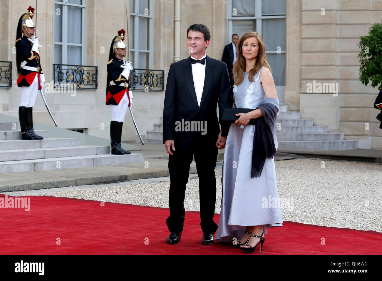 Paris, France. 06th June, 2014. French Prime Minister Manuel Valls (L) and his wife Anne Gravoin arrive at Elysee Palace for state dinner in honor of the Queen Elizabeth II. © Nicolas Kovarik/Pacific Press/Alamy Live News Stock Photo