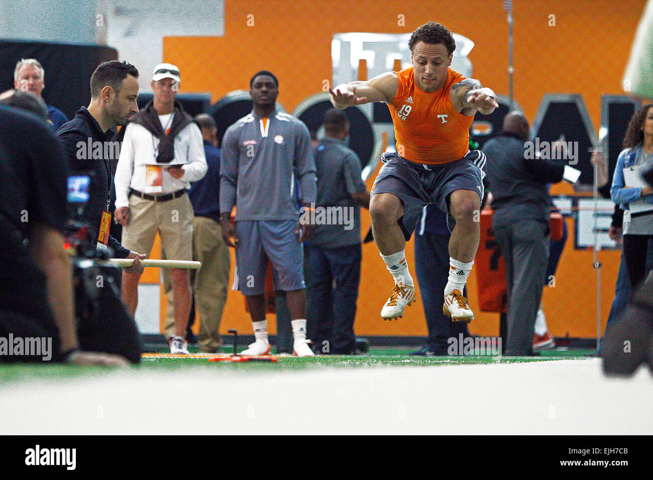 March 25, 2015 Devrin Young does the standing long jump during NFL Pro