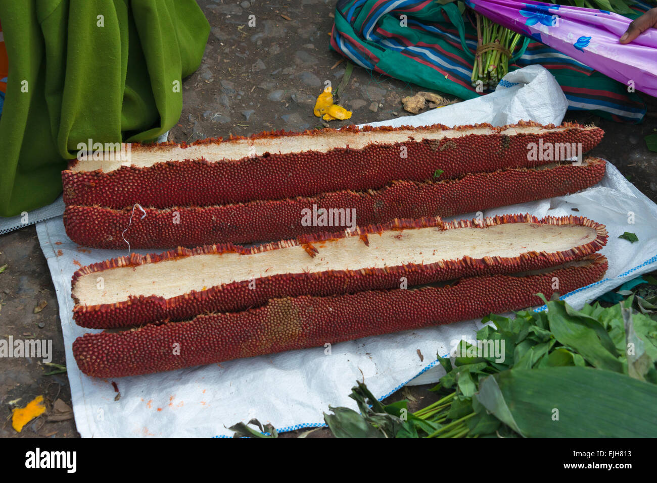 Tawi, also known as red fruit, at local market, Wamena, Papua, Indonesia Stock Photo