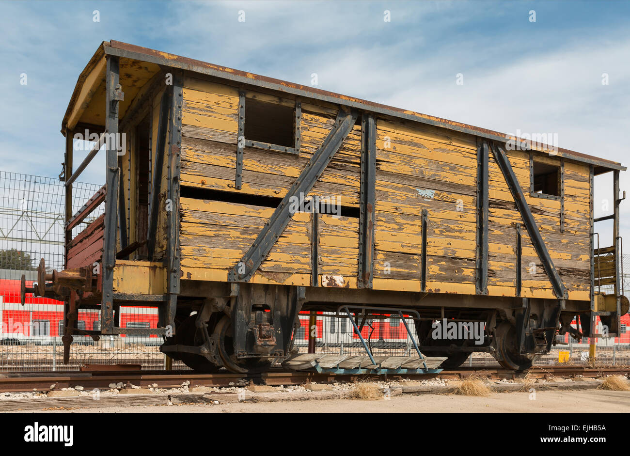 old railway cars stand on the track Stock Photo