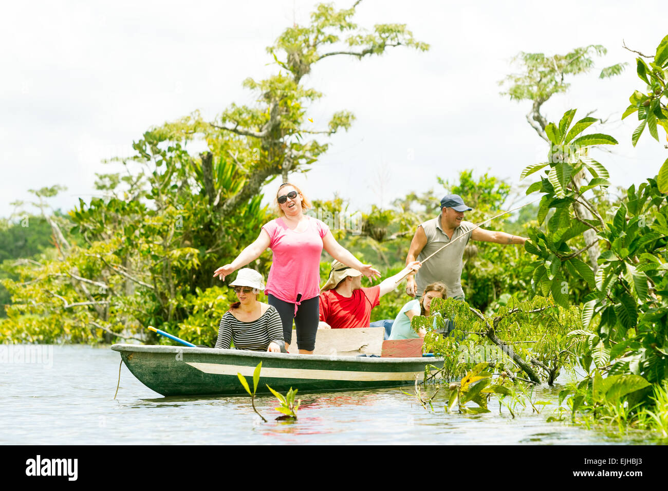 Tourists Fishing Legendary Piranha Fish In Ecuadorian Amazon Primary Jungle Stock Photo