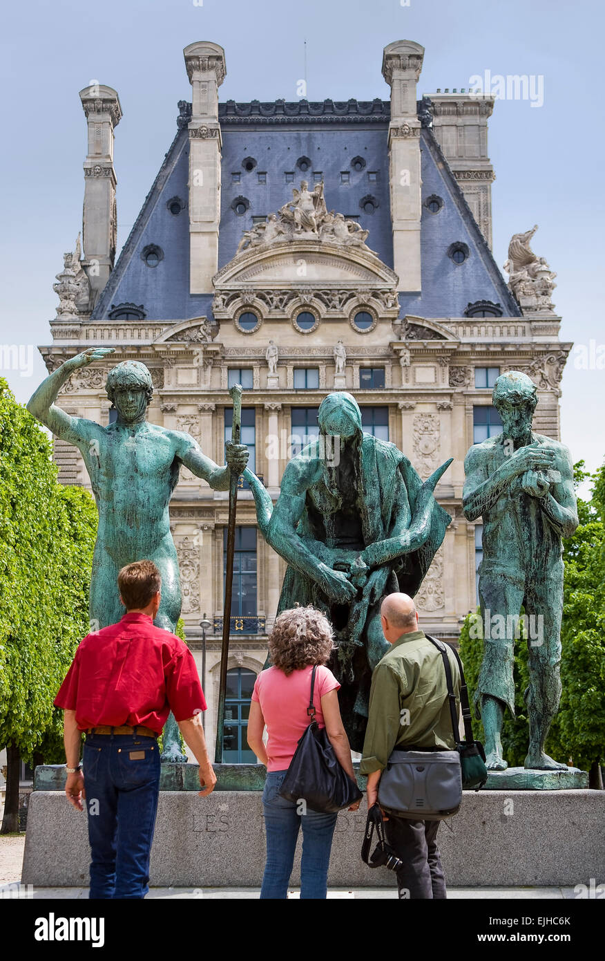 Visitors looking at statues on the Terrasse du Bord de L'eau, Paris, France Stock Photo
