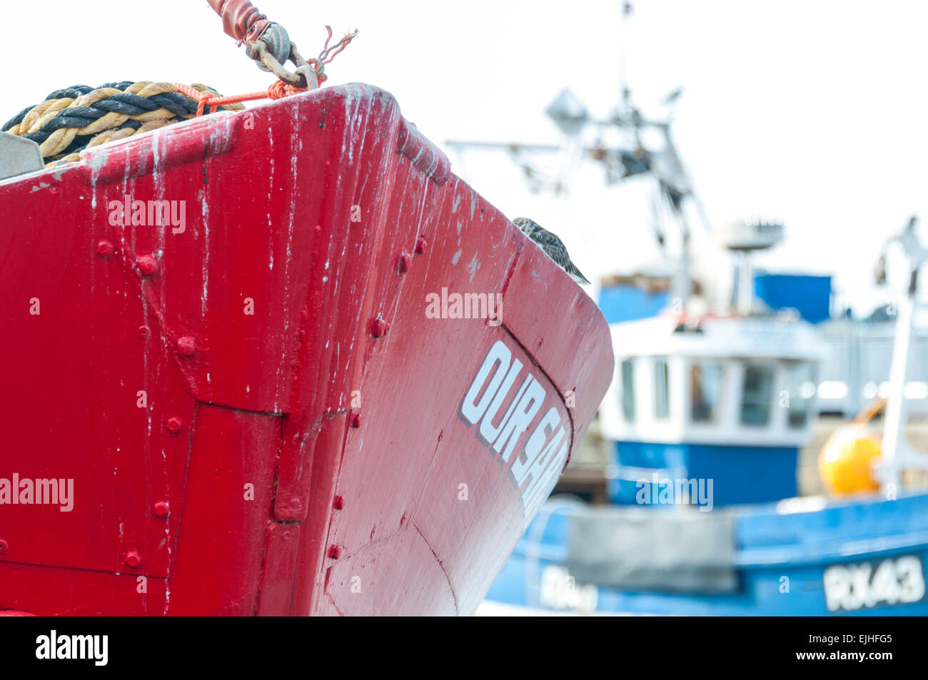 Close up of the bow of a fishing boat moored at Whitstable harbour in Kent Stock Photo