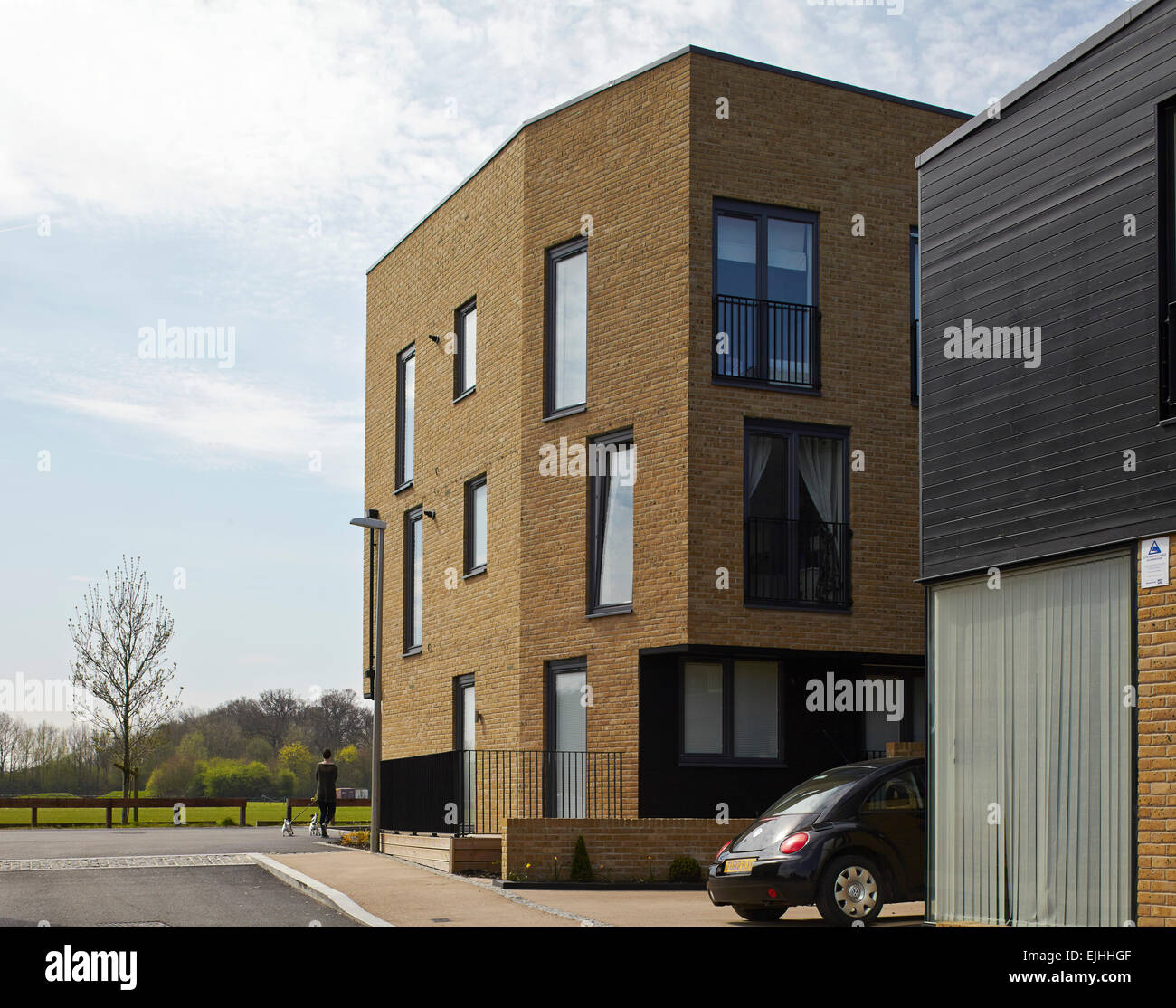 Facade perspective with green beyond. Housing Newhall Harlow, Newhall