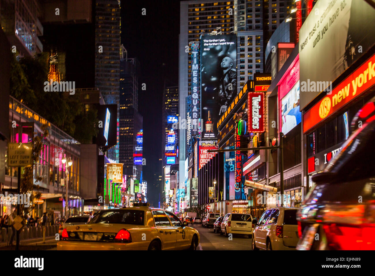 Times Square at night with lights, New York City, USA Stock Photo
