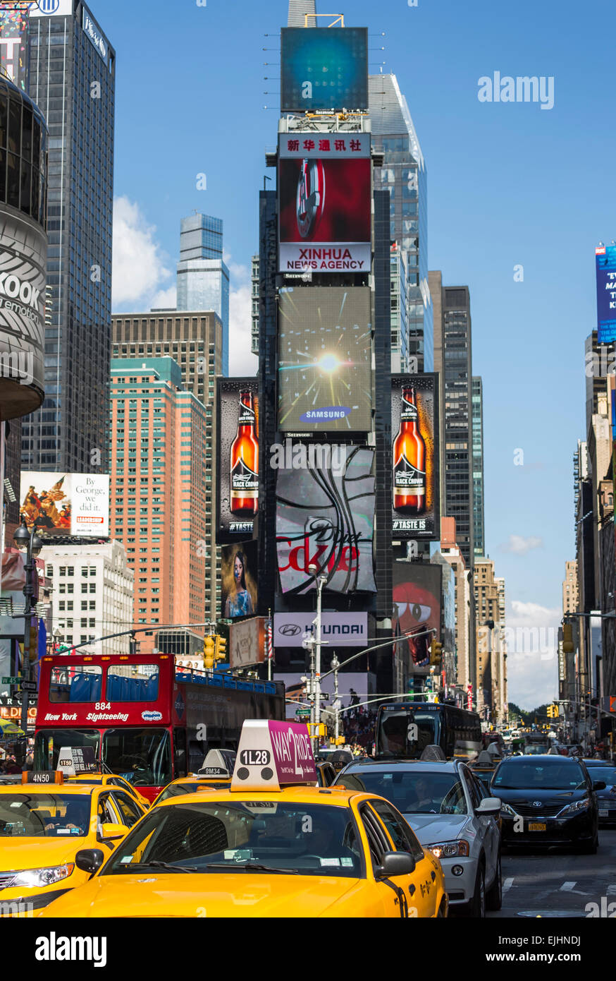 Times Square by day with traffic, New York City, USA Stock Photo