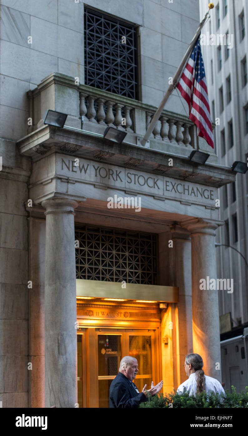 People at back entrance to New York Stock Exchange, New York City, USA Stock Photo