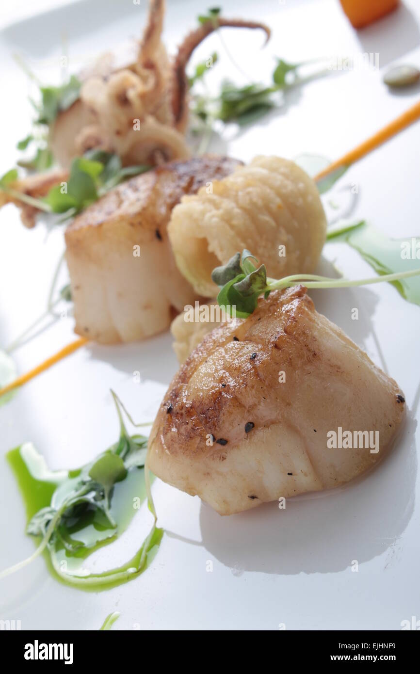 pan fried scallops plated meal appetizer starter Stock Photo Alamy