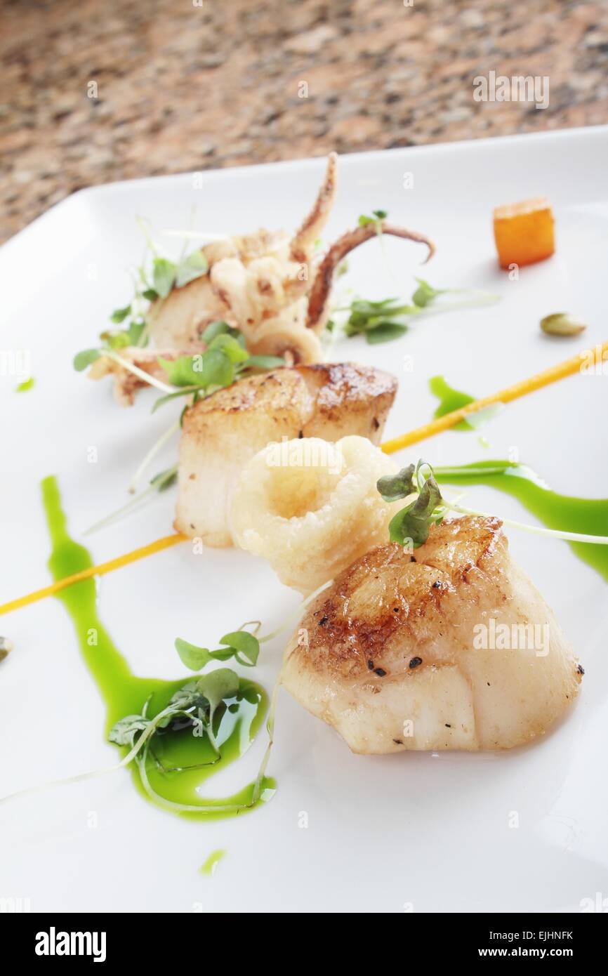 pan fried scallops plated meal appetizer starter Stock Photo Alamy
