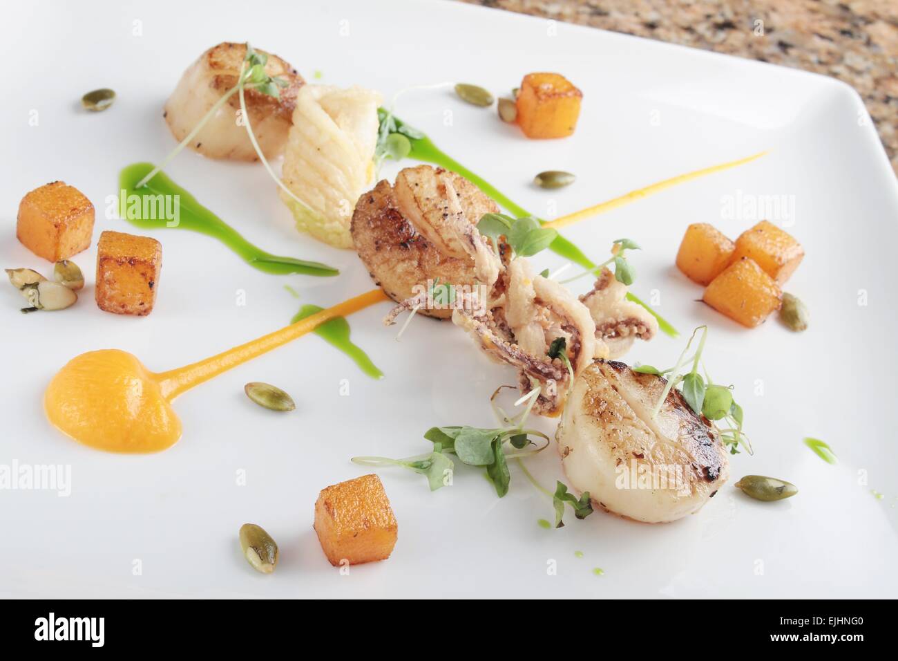 pan fried scallops plated meal appetizer starter Stock Photo Alamy