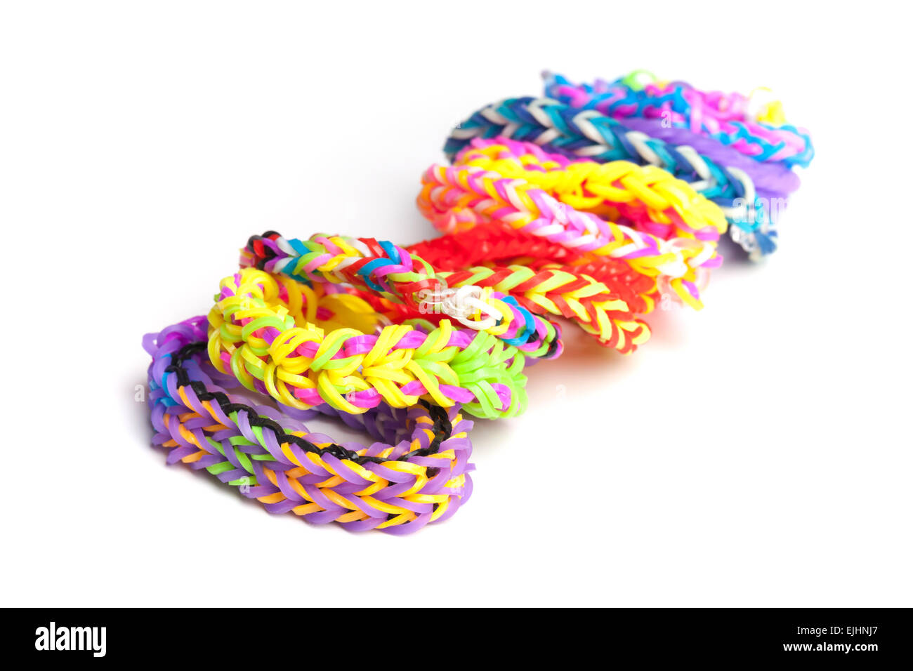 Colorful rubber band bracelets isolated on white, trendy kids fashion accessories Stock Photo