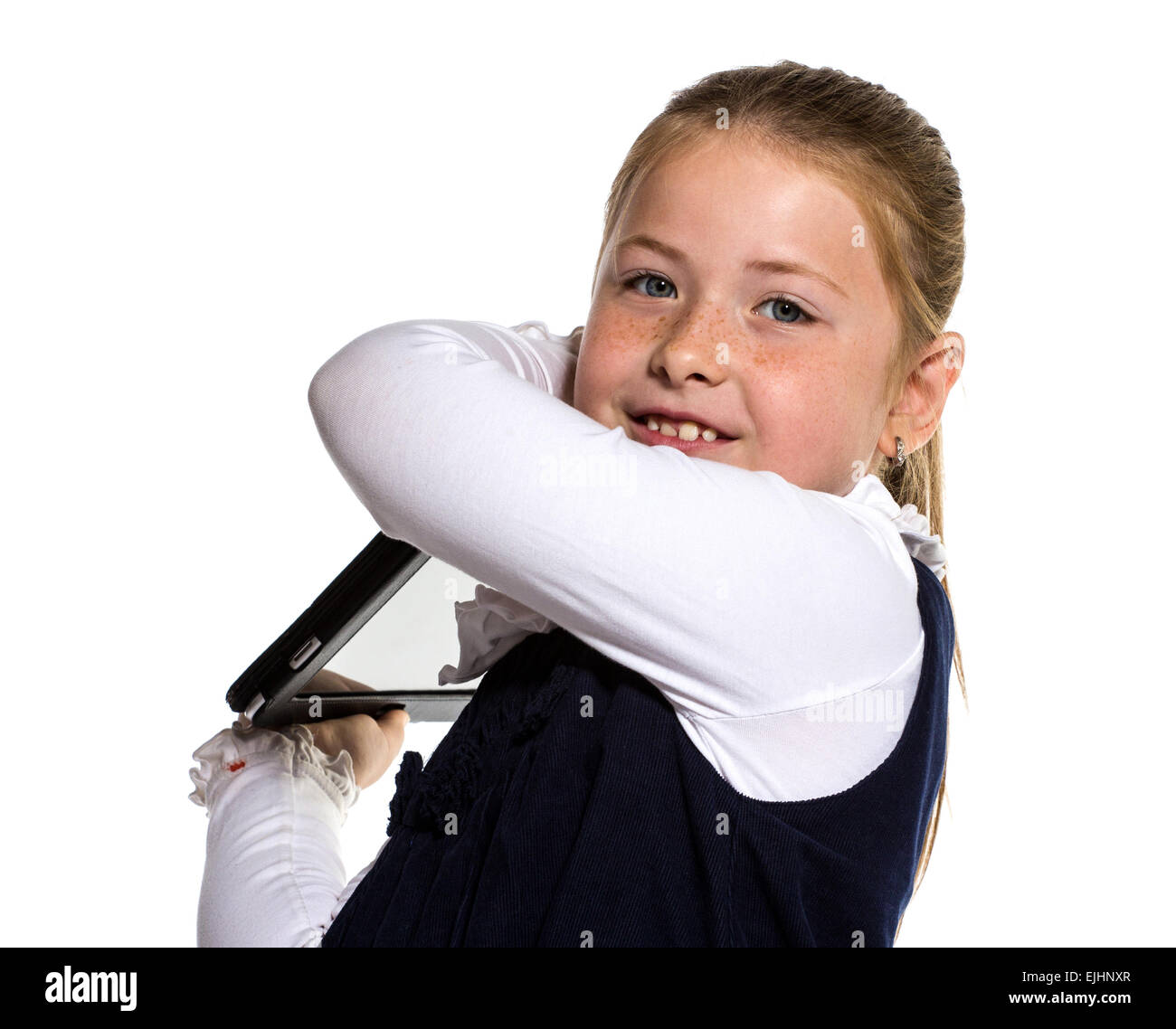 The girl throws her own tablet computer. Isolated on white Stock Photo