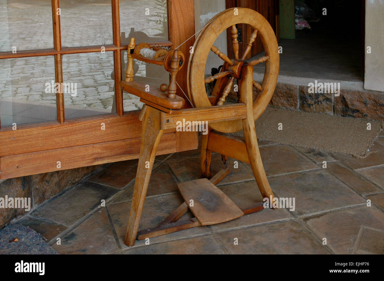 Wooden Spinning Wheel Stock Photo Alamy