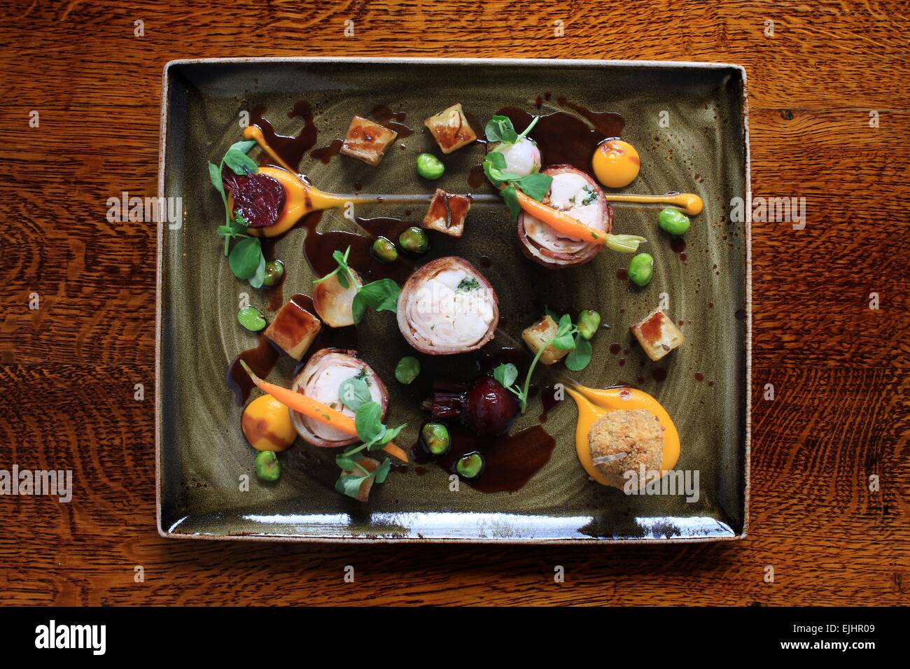 rabbit chicken roulade with vegetables Stock Photo - Alamy