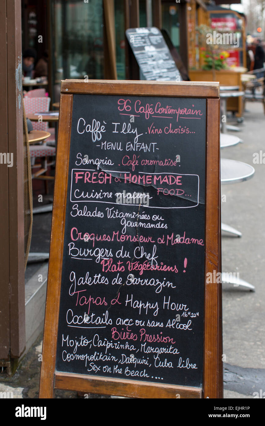 Chalkboard menu outside cafe restaurant Illy in Paris, France Stock Photo