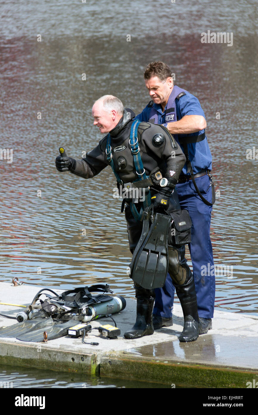 Diver from the Metropolitan Police Service Marine Support Unit gives a thumbs up during a training exercise.. Stock Photo