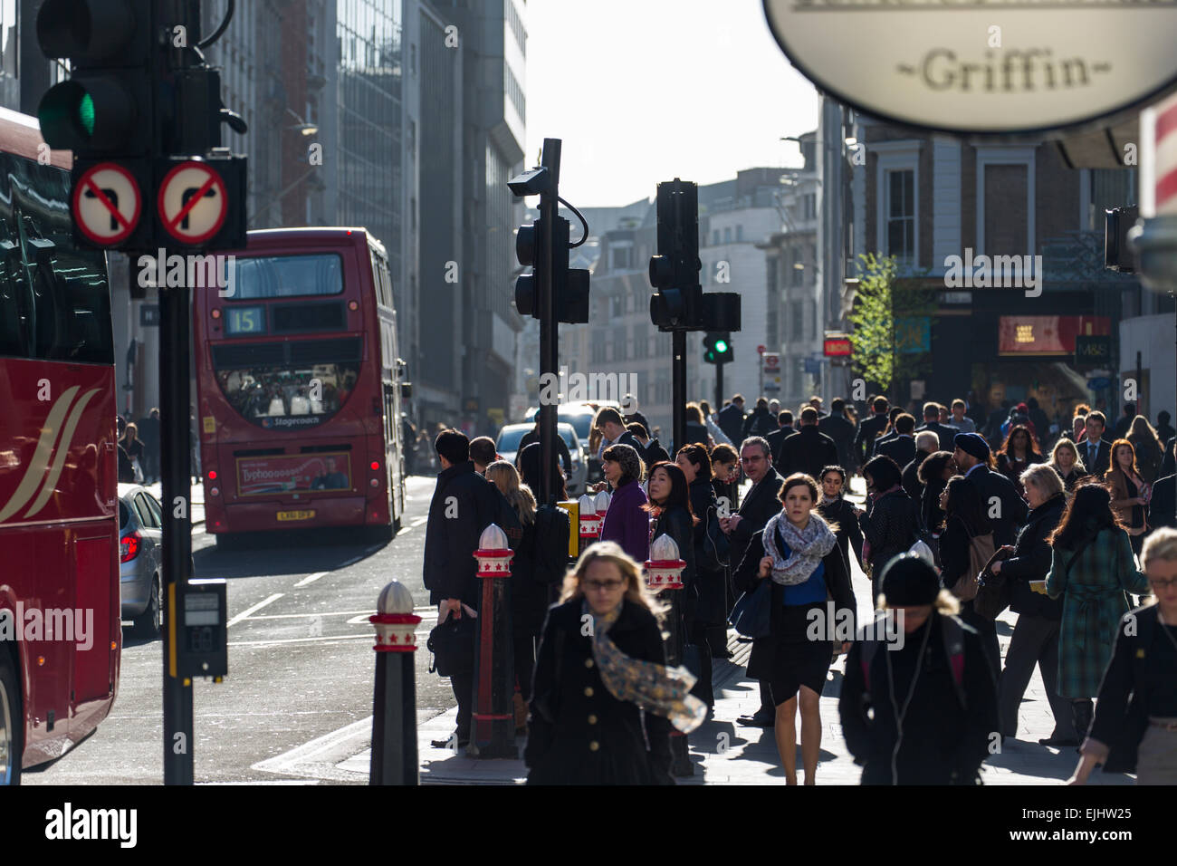 People going to work in the City of London at morning rush hour, London, England Stock Photo
