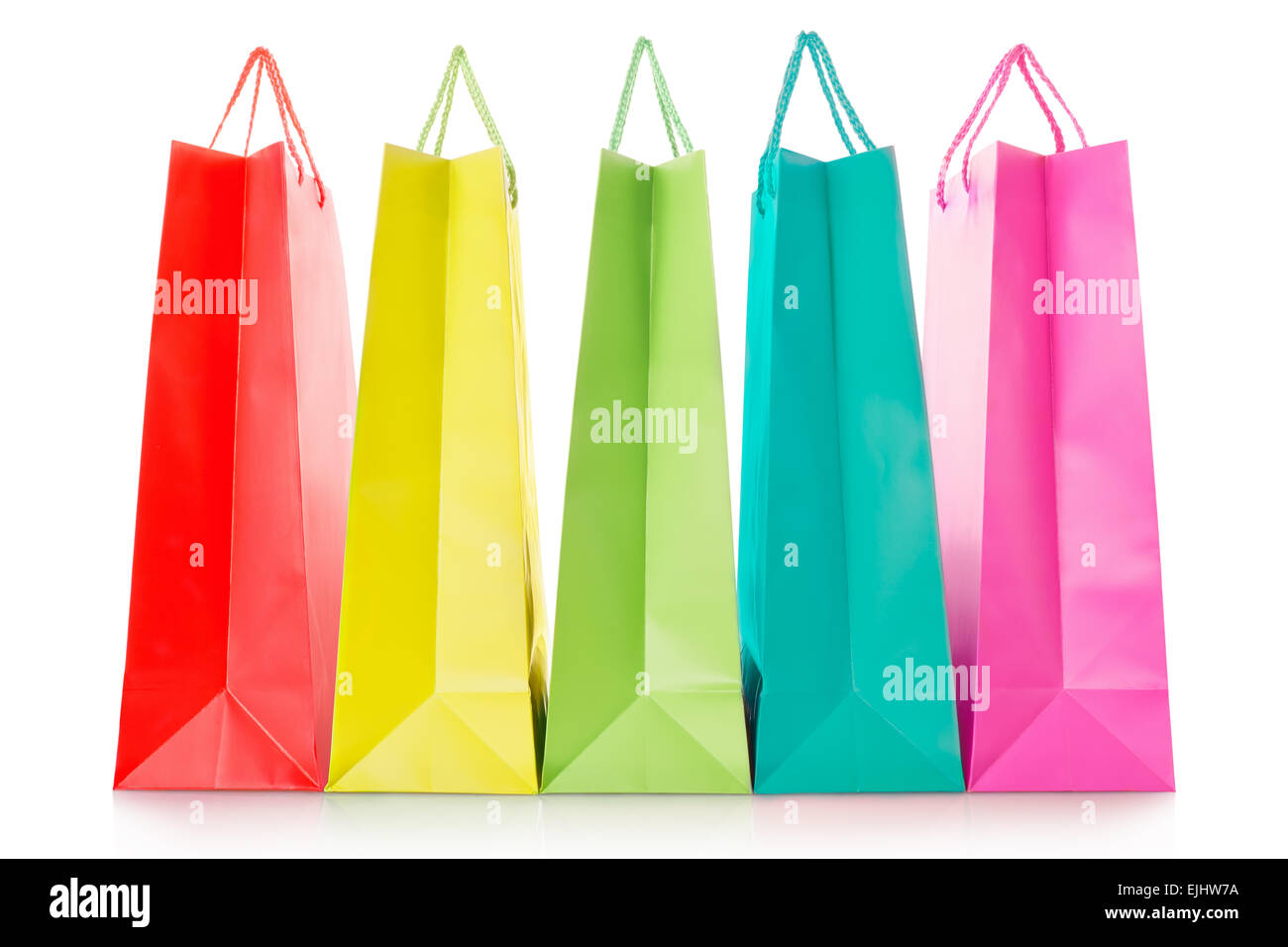 Colorful shopping bags in paper on white Stock Photo