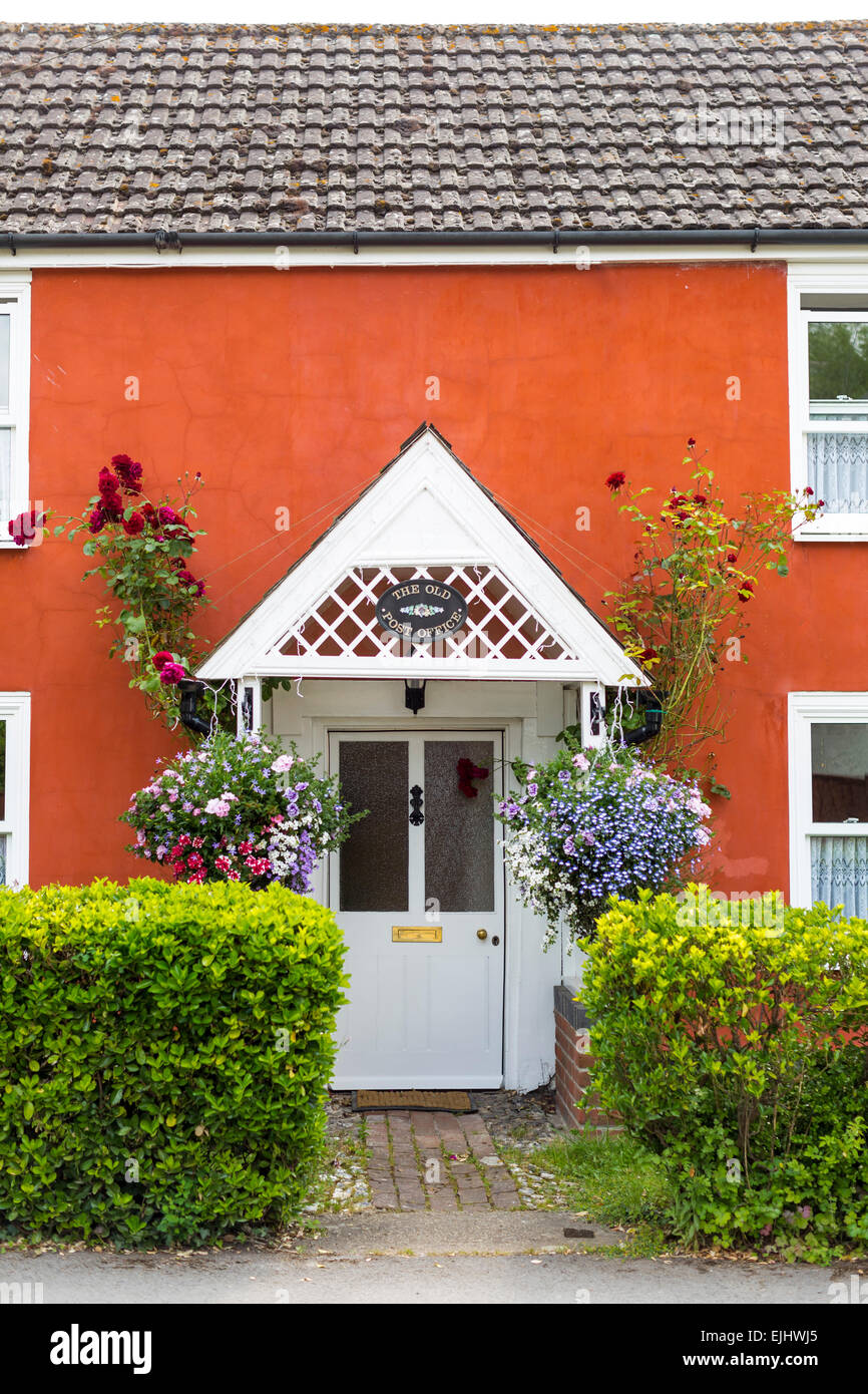 Front entrance of pretty house with flowers, near Mottisfont, Hampshire, England Stock Photo