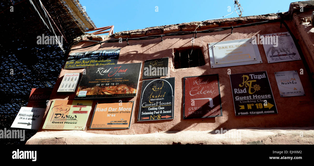 Signs to Riad accommodation in Marrakesh souk Stock Photo