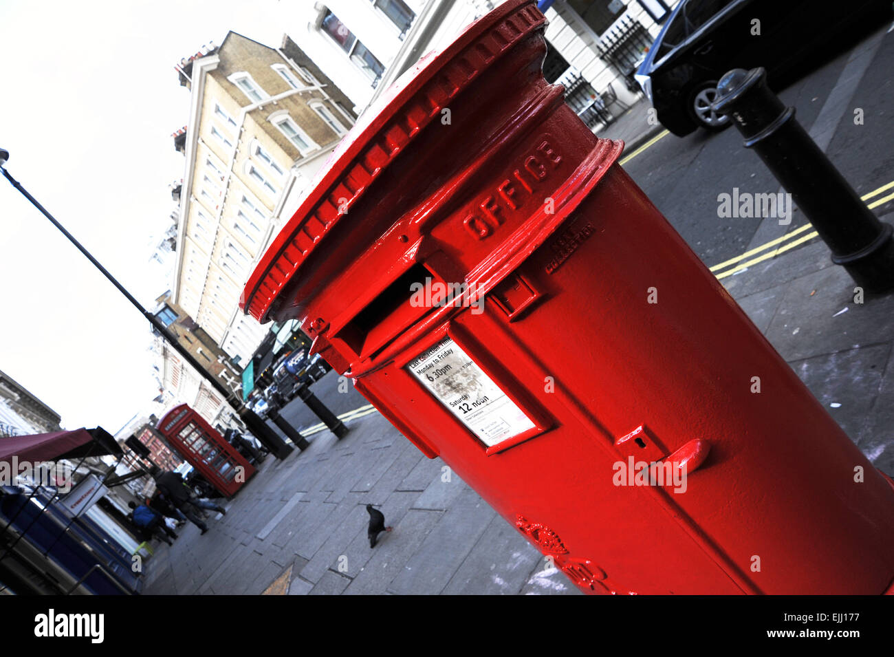 London England UK -  Red Royal Mail post box in Covent Garden area Stock Photo
