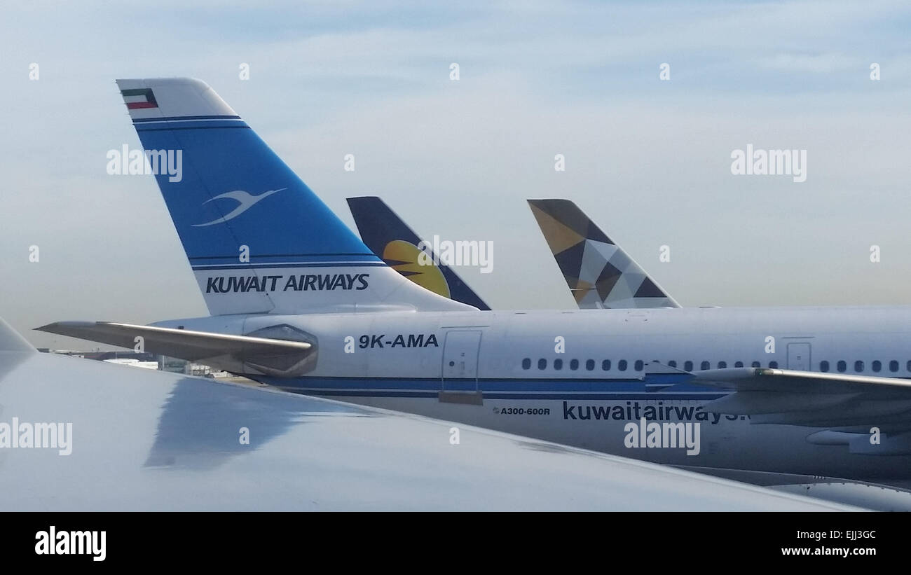 Tail fin of a Kuwait Airways jet liner docked at Heathrow Terminal Four in London.  Credit: David Mbiyu/ Alamy Live News Stock Photo