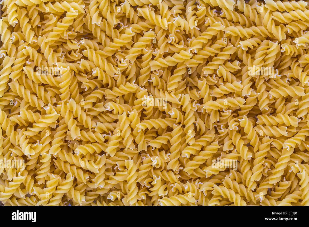 Fusilli pasta macro as background structure Stock Photo Alamy