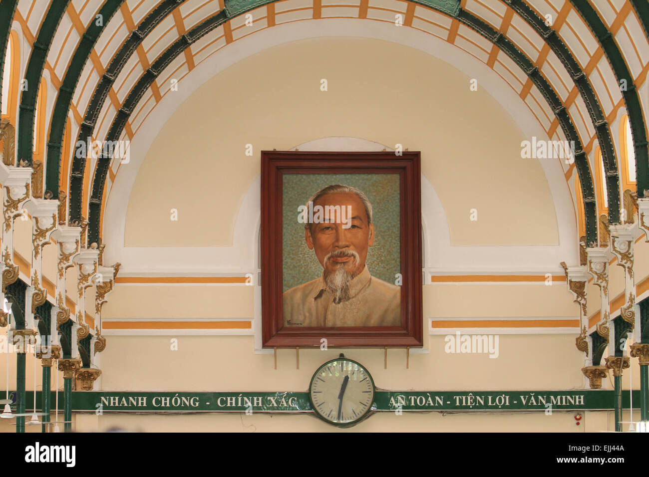 Interior of the Saigon post office with a large portrait of Ho Chi Minh. Ho Chi Minh was a Vietnamese Communist revolutionary leader who was prime minister (1945–55) and president (1945–69) of the Democratic Republic of Vietnam (North Vietnam) . Credit: David Mbiyu/ Alamy Live News Stock Photo