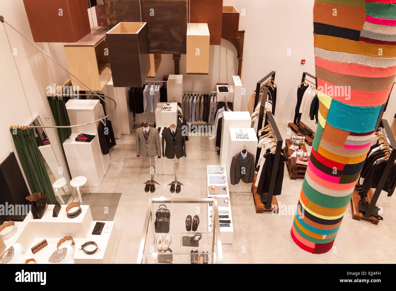 Men's and women's clothing store, Comme des Garcons, in the Dover Street Market, New York City. Stock Photo