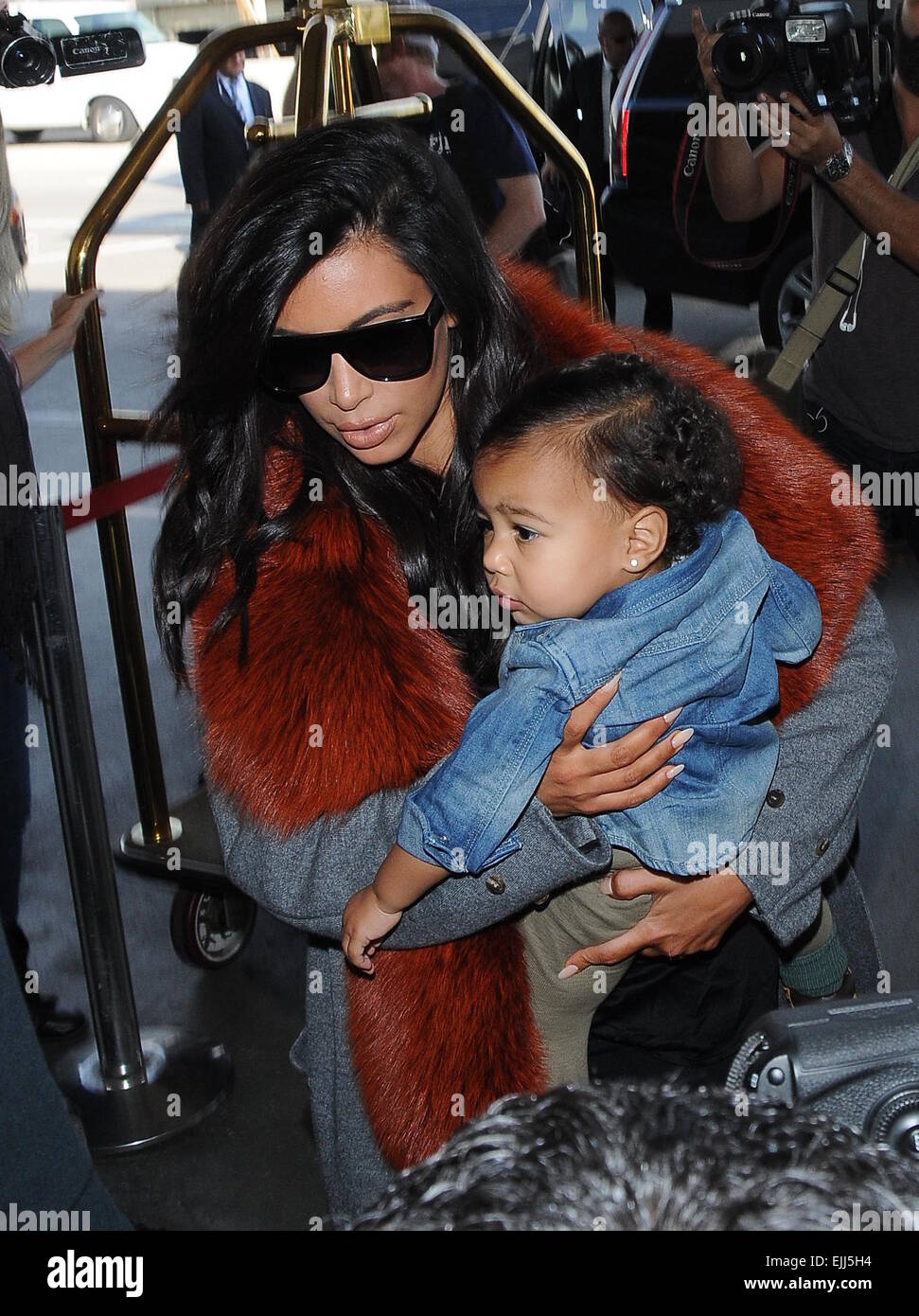 kim kardashian and baby daughter north west arrive at los angeles EJJ5H4
