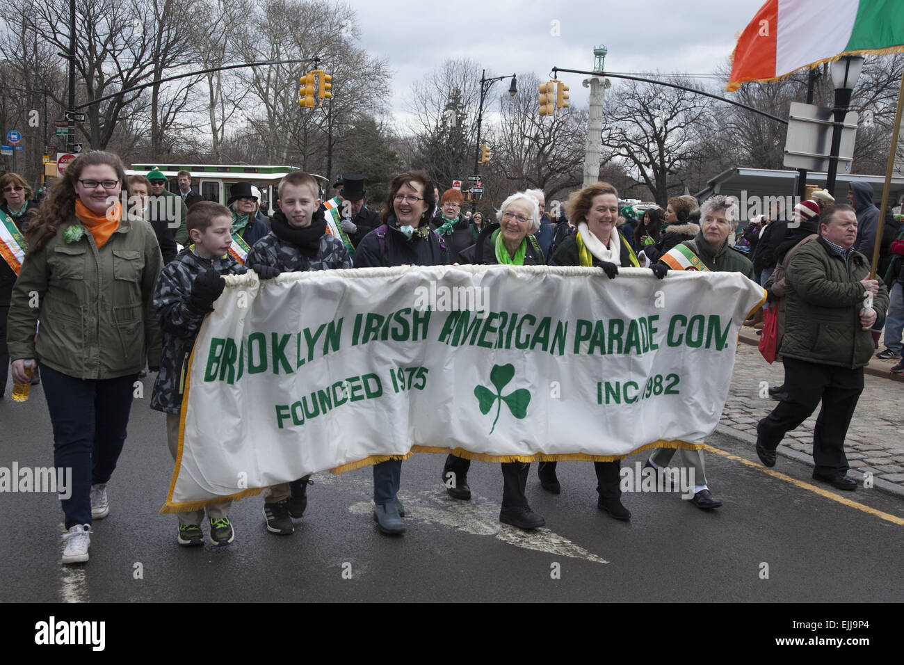 Women and boys carry a banner leading the Brooklyn Irish American Parade in Park Slope, Brooklyn, NY. Stock Photo