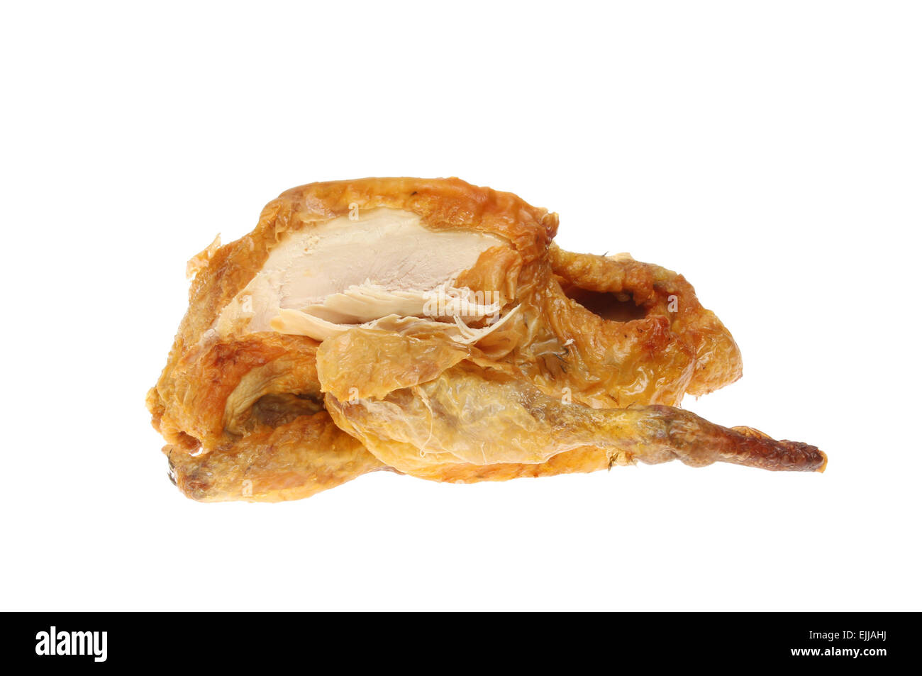 Part carved roast Guinea fowl isolated against white Stock Photo