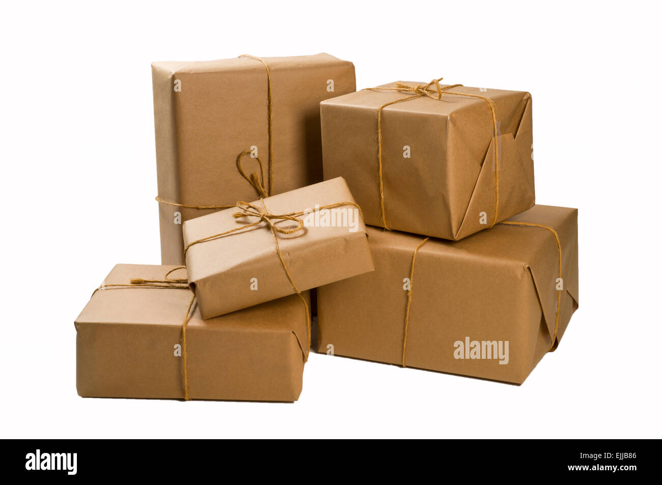 Stack of brown paper wrapped parcels for shipping Stock Photo Alamy