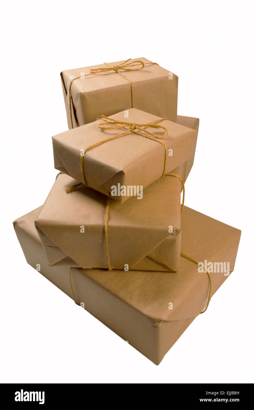 Stack of brown paper wrapped parcels for shipping Stock Photo Alamy