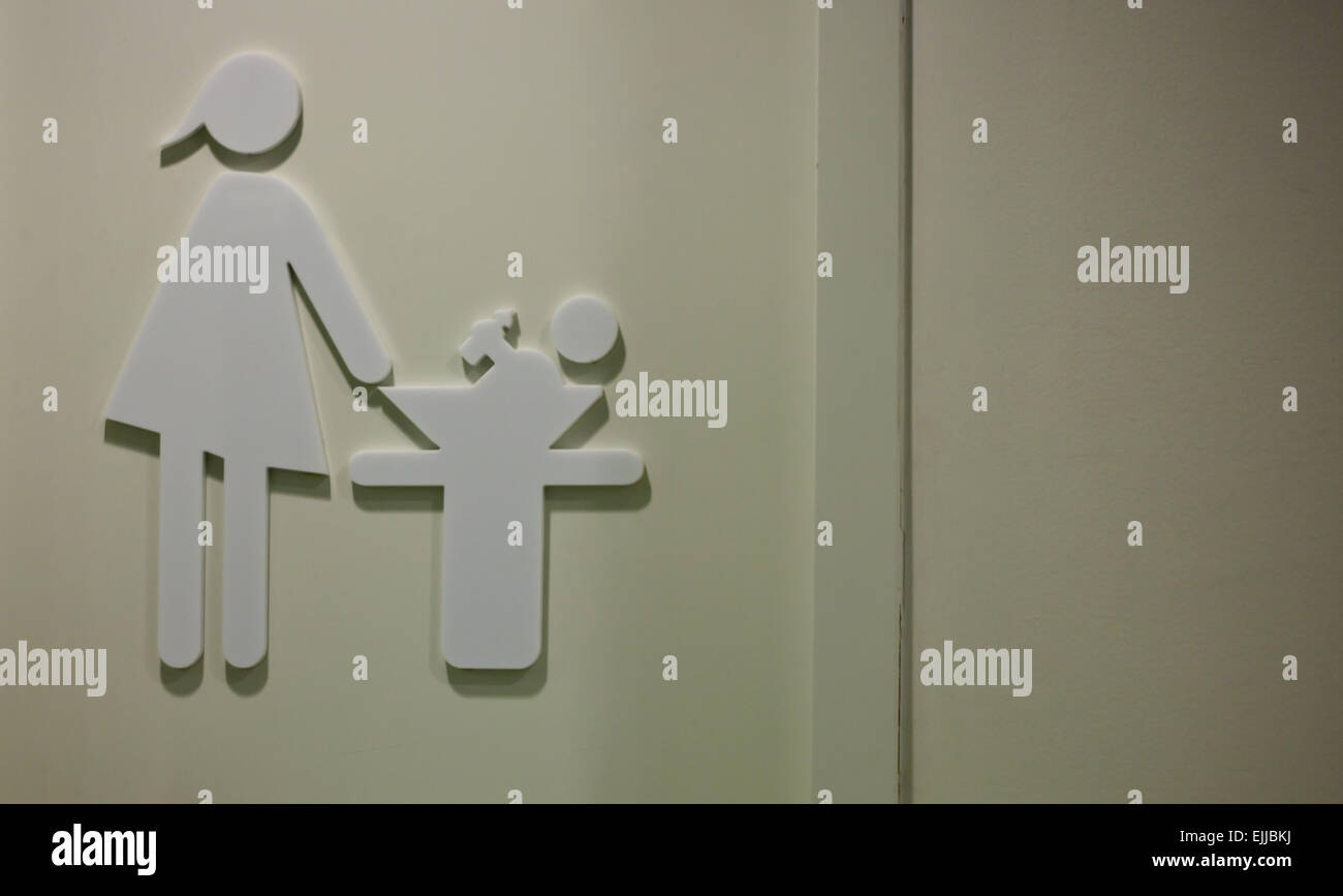Door with pictogram of breastfeeding and changing room in a shopping center Stock Photo