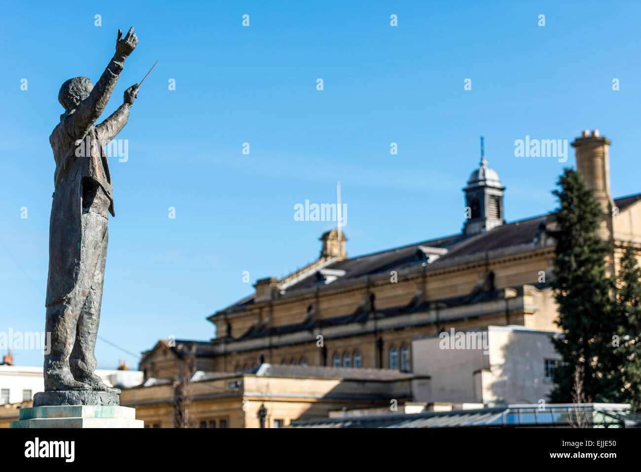 Overlooking The Town Hall A Statue Of Music Composer Gustav Holst In 