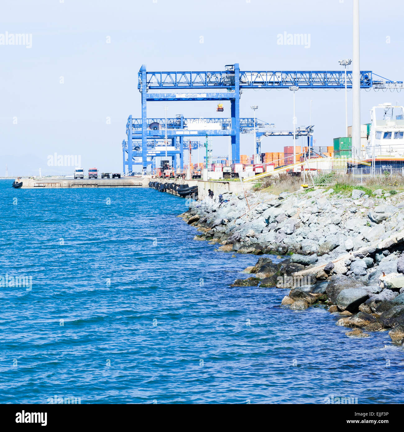 Cranes at the port channel - Cagliari Stock Photo