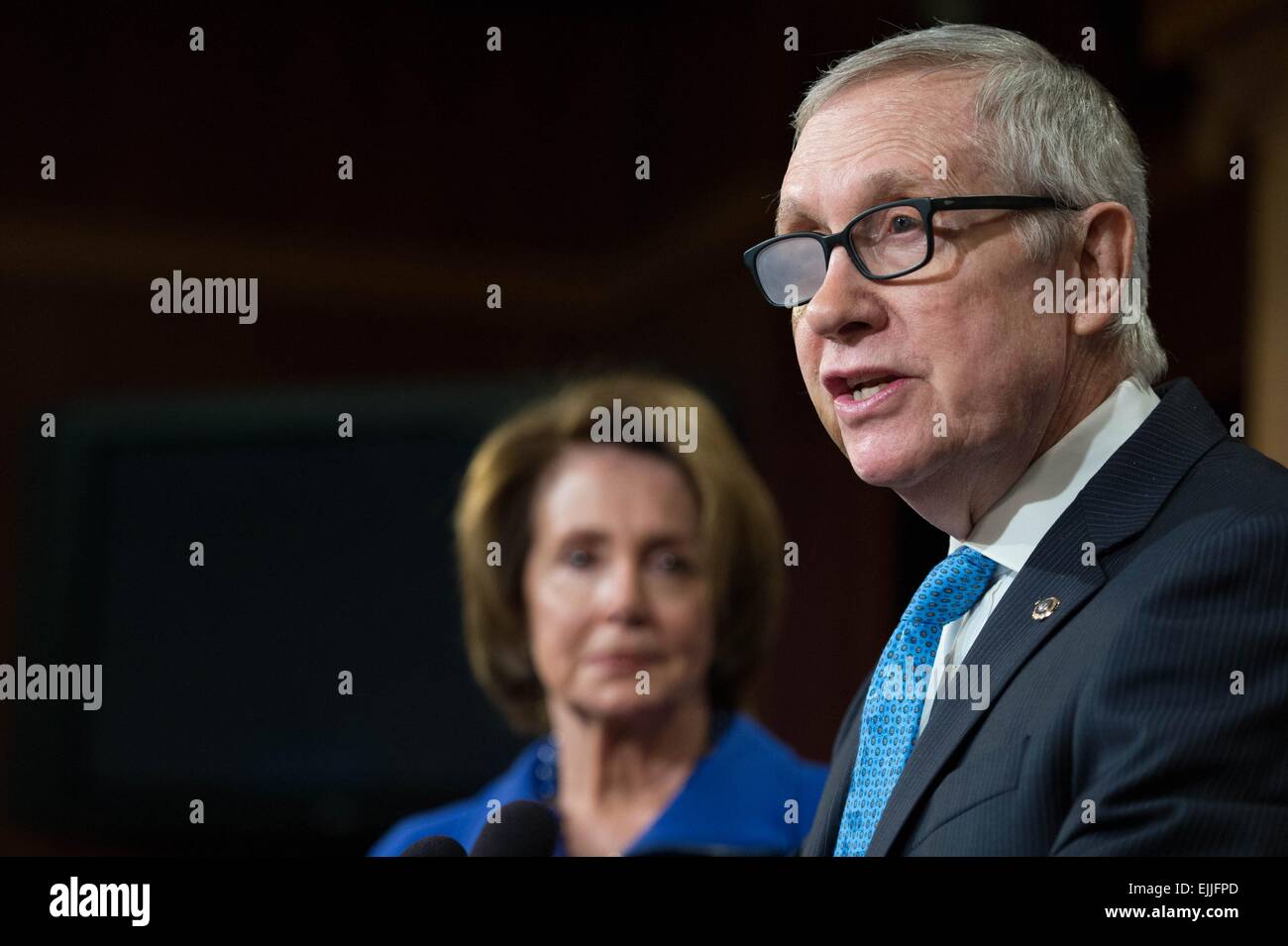 US Democratic Senate Leader Harry Reid medical glasses over his injured eye during a press conference February 26, 2015 in Washington, DC. The 75-year-old Reid suffered an accident while exercising on New YearÕs Day resulting in four broken ribs and may leave him permanently blind in one eye. Stock Photo