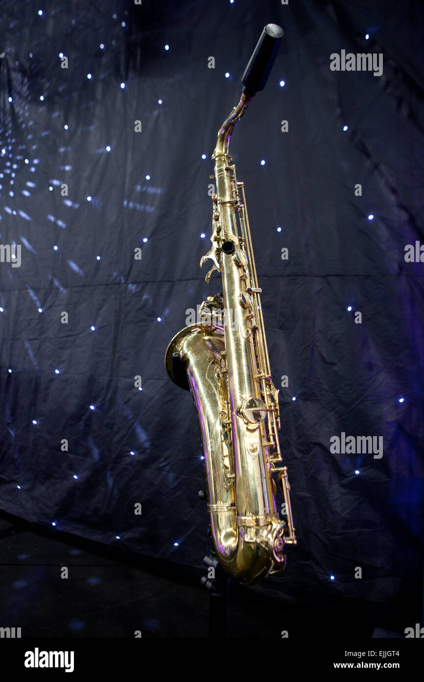 Isolated saxophone over black background with little led lights points shininhg as stars Stock Photo