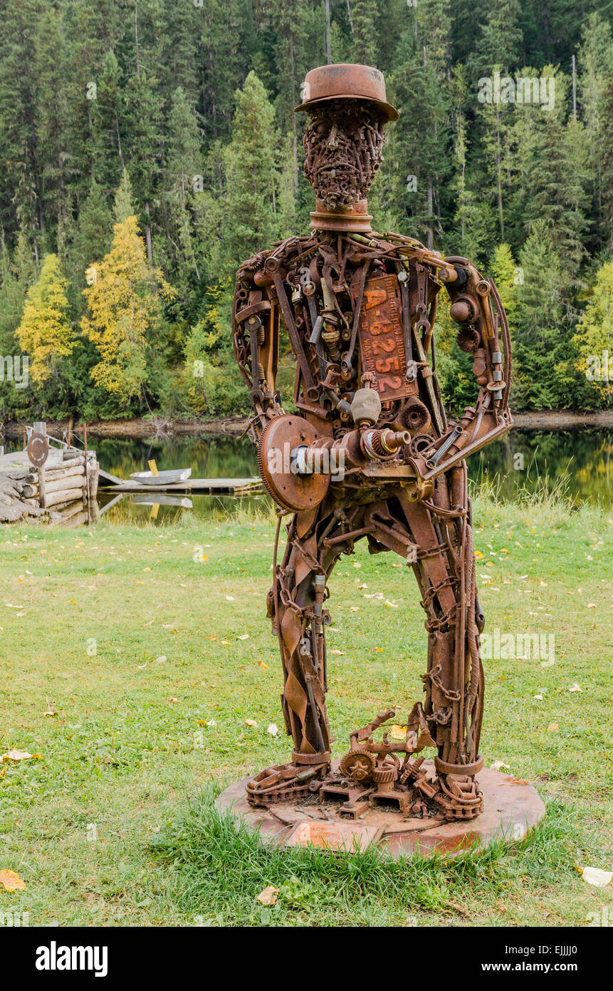 Sculpture made from rusty iron machine pieces, Likely, British Columbia, Canada Stock Photo