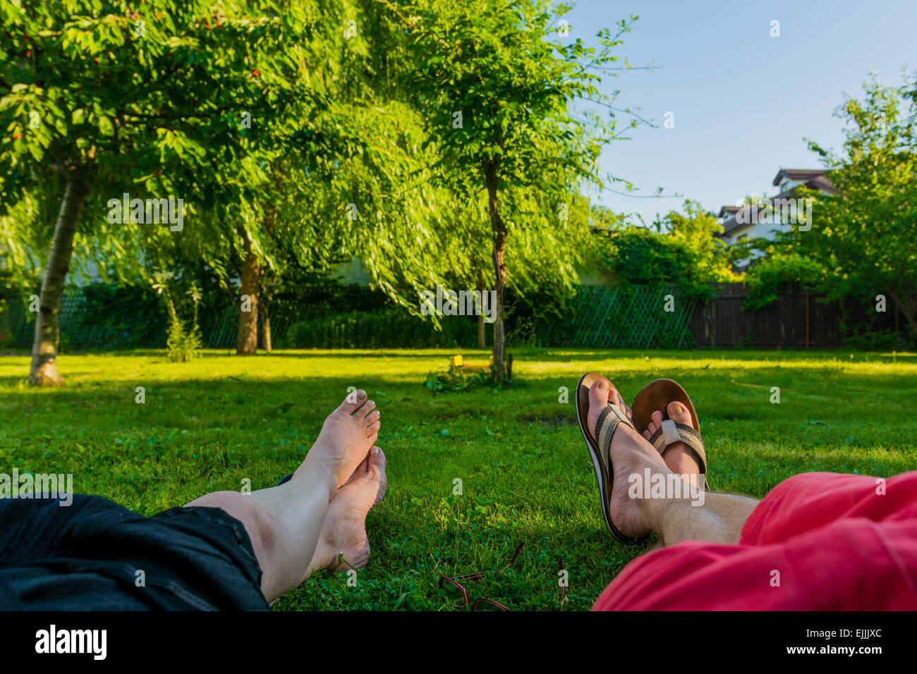 Relaxation concept. Lying on the grass. Stock Photo
