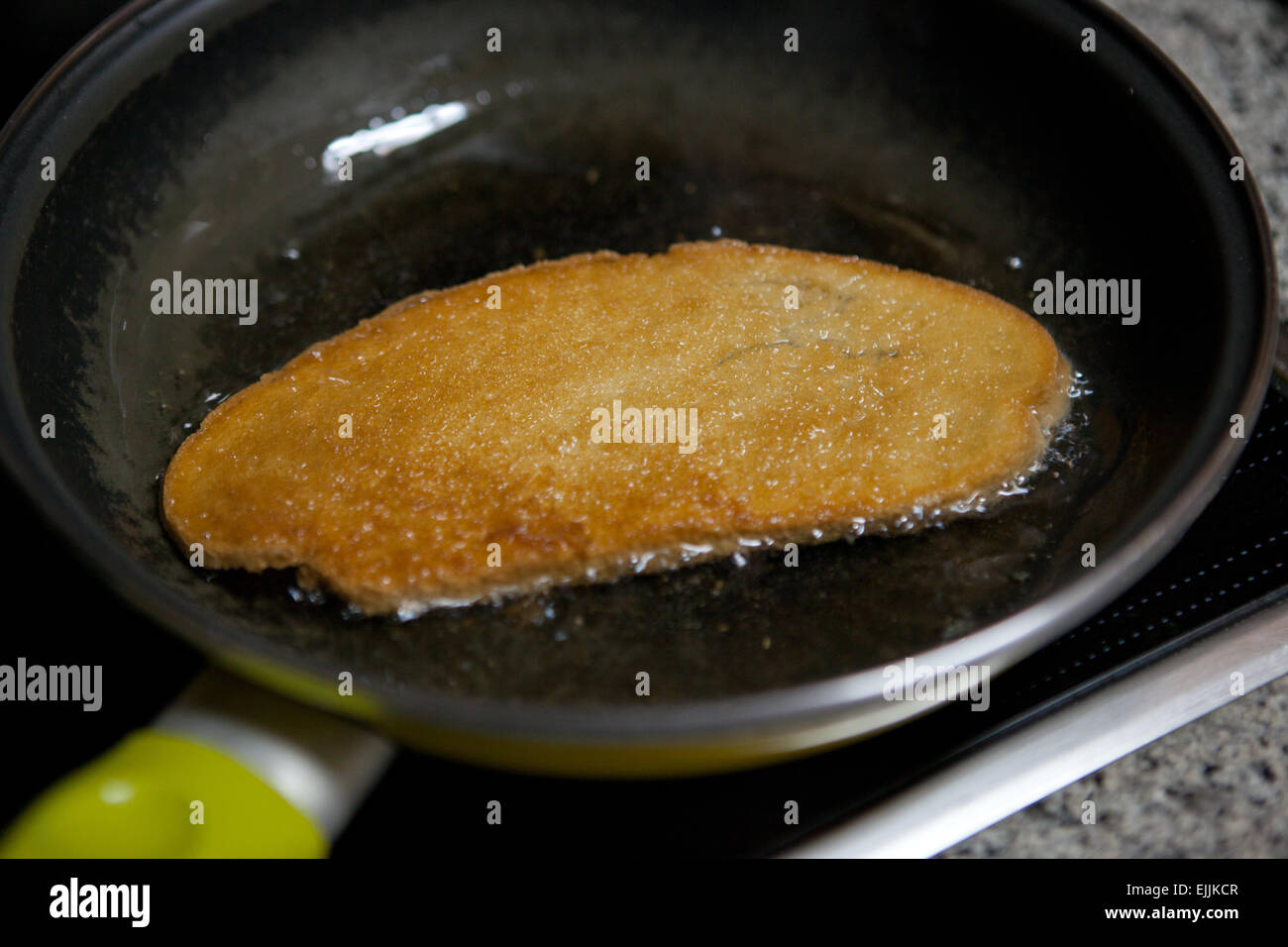 Preparation of fried bread slices, and spanish typical meal for breakfast, also called pringas