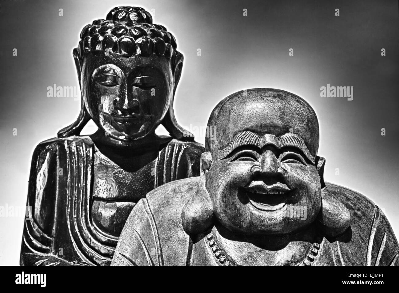 Chinese and thailand representation on wooden figurines of Buddha Stock Photo