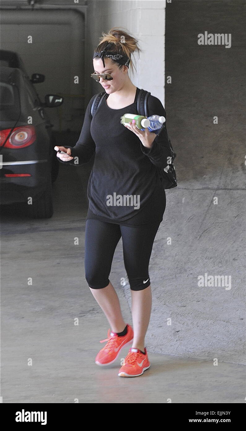 Khloe Kardashian leaves the gym in cropped black leggings and bright orange  Nike sneakers and sporting a head scarf Featuring: Khloe Kardashian Where:  Los Angeles, California, United States When: 22 Sep 2014