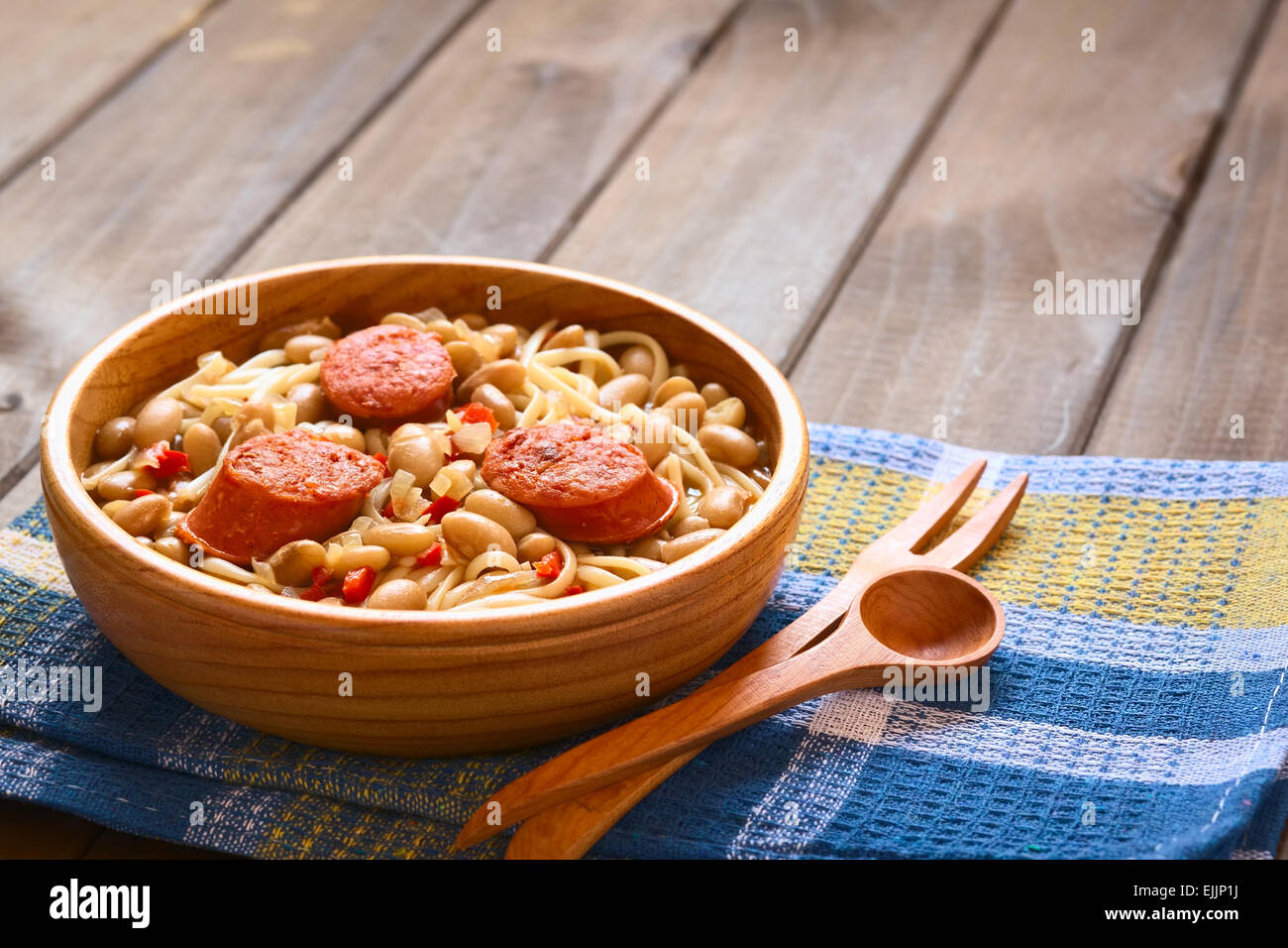 Traditional Chilean dish called Porotos con Riendas (English: beans with reins), made of cooked beans, linguine (flat spaghetti) Stock Photo