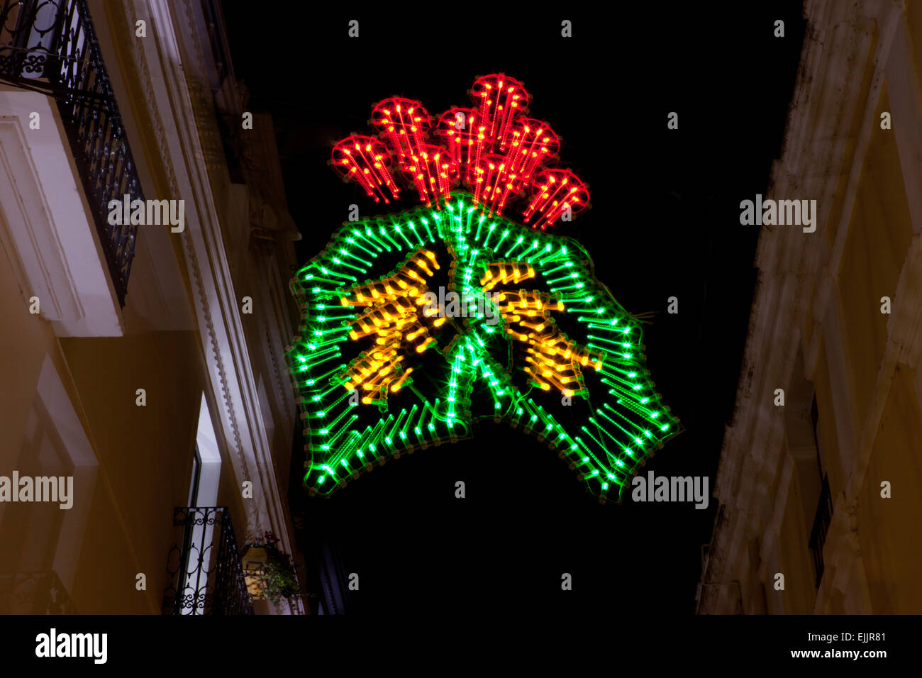 Christmas branch light decoration of Badajoz streets, Spain. Motion zoomed shot Stock Photo