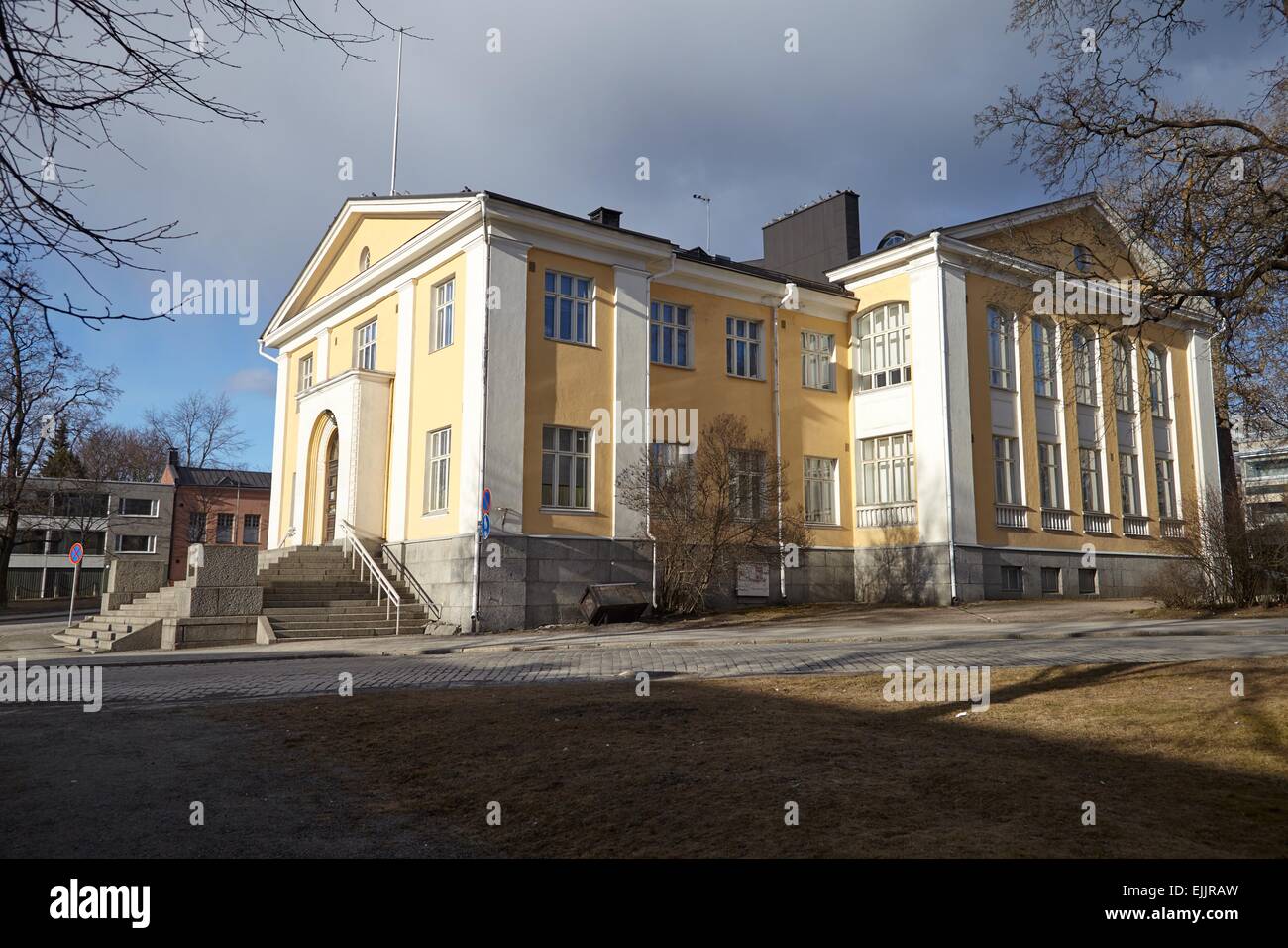Old library of Hameenlinna in Finland. Early spring sun shining straight to the walls of the building. Stock Photo